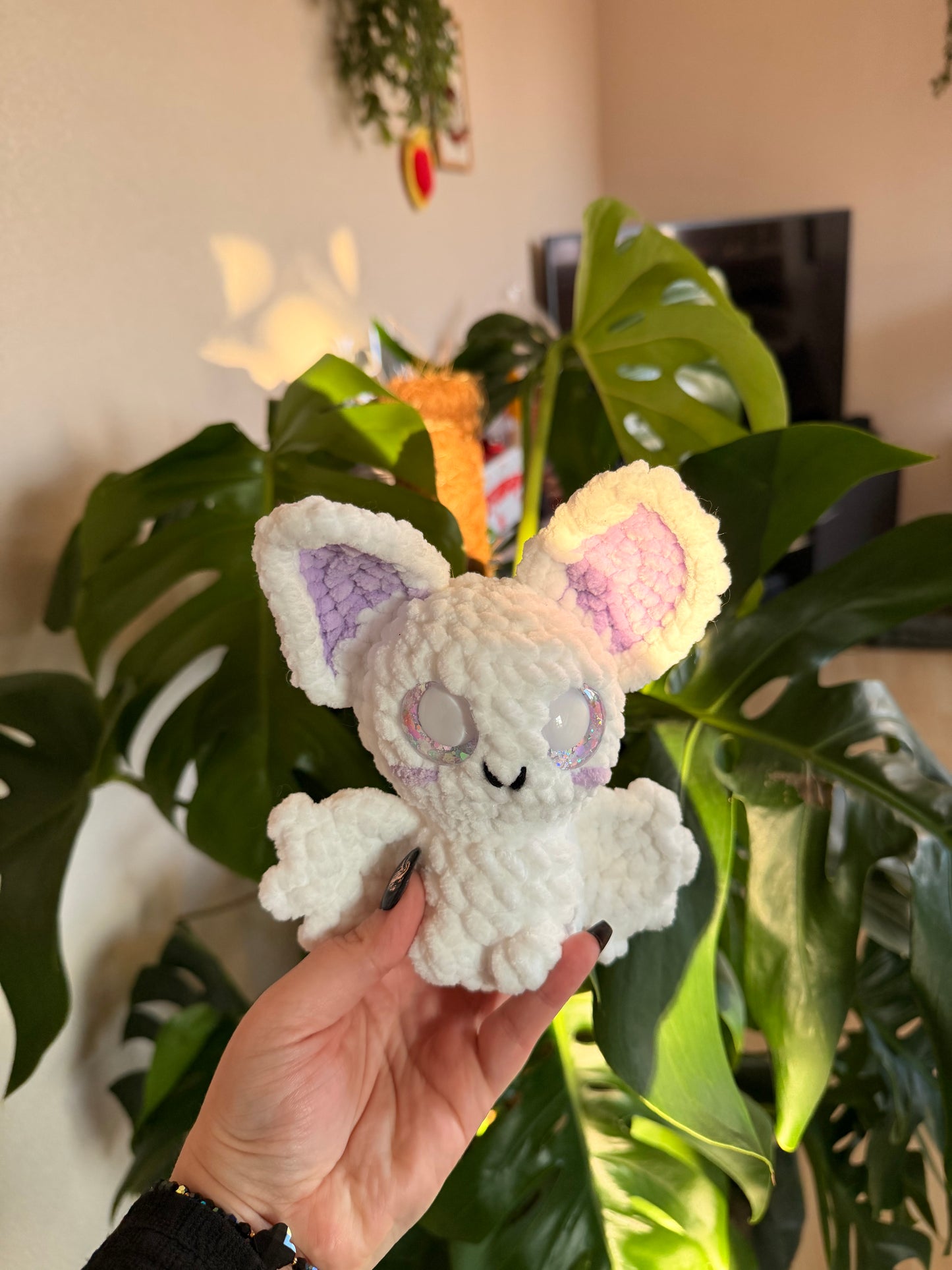 Peluche chauve souris blanche et mauve