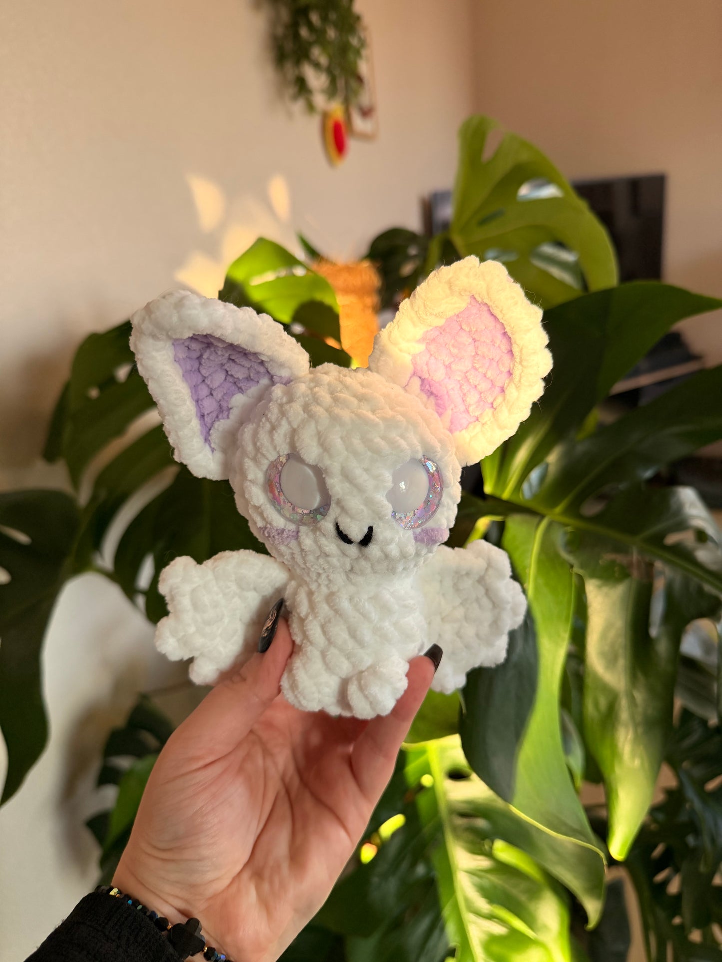 Peluche chauve souris blanche et mauve