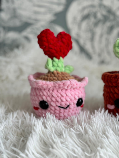decoration plante en pot rose au crochet fait main fleurs et feuilles au crochet