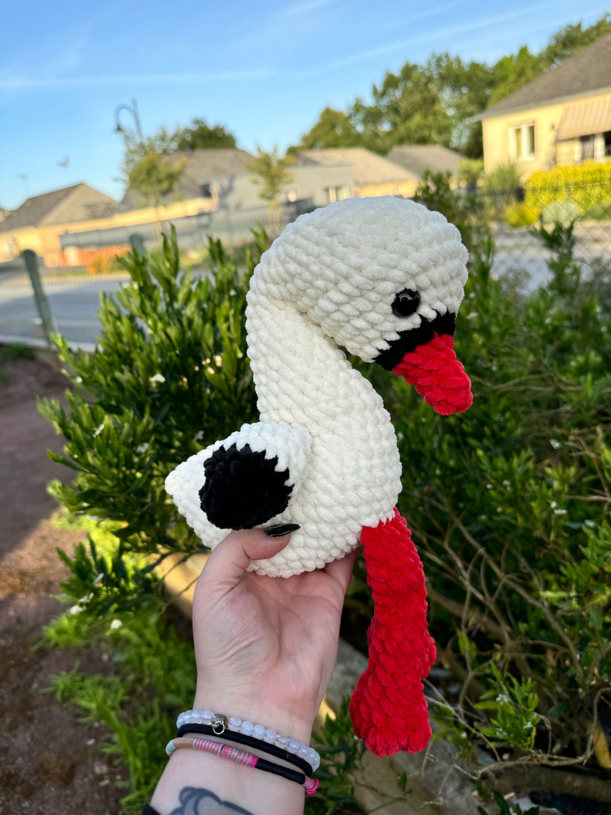 peluche cigogne alsace au crochet fait main en France amigurumi cigogne crochet