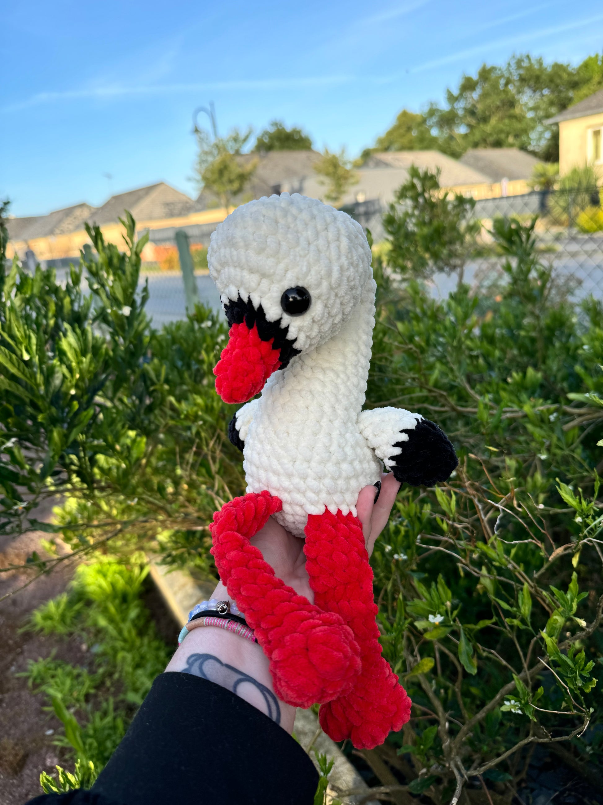 peluche cigogne alsace au crochet fait main en France amigurumi cigogne crochet