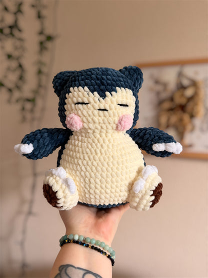 Peluche Ronflex (Snorlax) en Crochet - Amigurumi Pokémon fait main

Craquez pour cette peluche Ronflex au crochet, une création artisanale unique inspirée de l’univers Pokémon et crochetée à la main par mes soins. Avec ses 25cm, cette peluche amigurumi fait main impressionnera par sa taille et surtout sa douceur.